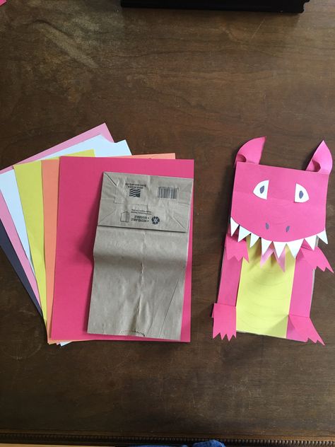 Chinese Dragon puppet made with brown paper bag, construction paper and stick glue. Dragon Paper Bag Puppet, Chinese Dragon Puppet, Bag Construction, Bag Puppet, Paper Bag Puppets, Dragon Puppet, Puppet Making, Kraft Bag, Kids Projects