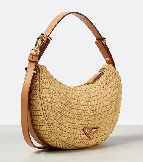 Prada Arqué raffia-effect shoulder bag in beige - Prada | Mytheresa Leather Crochet, Crochet Bags Purses, Crochet Bags, Crochet Bag, Prada, Dust Bag, Shoulder Strap, Shoulder Bag, Purses And Bags