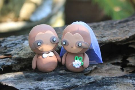 Every girl dreams of her perfect wedding day. This cute Sloth wedding topper bride and groom is the ultimate way to display on animal lover wedding. They are 100% handmade with high quality, non-toxic polymer clay which is stable and lightweight. They will sit on any type of cake without sinking. These are made specially for you. #weddingcaketopper #slothwedding #internationalcouple #brideandgroom #weddingringholder #weddingcentepeice #decoration #lovegift #handmadegift #love #customuniquegift Sloth Wedding, Wildlife Wedding, Animal Lover Wedding, Animal Wedding, Sloth Animal, Lover Wedding, Sloth Stuffed Animal, Types Of Cakes, Wedding Theme Colors