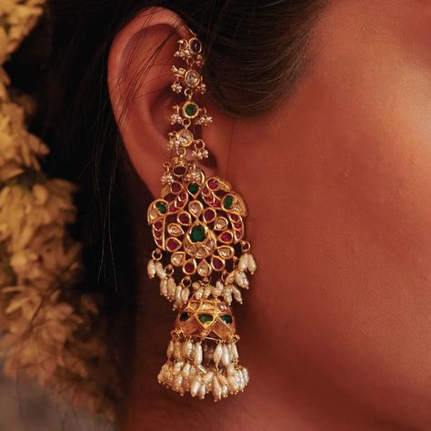 Embodying grace and sophistication in every detail are our exquisite 22K gold embossed drops. Featuring delicate peacock motif jadau designs, these drops are paired with fine rows of valanda, ruby, and emerald ear chains. WhatsApp 9964641869 for enquiries. 📍Visit the Blue CKC&Co. Flagship store , near Safina Plaza. Look for the DIAMOND logo! Featuring: @ciashetty Saree: @aikyatha Carpet: @carpetkingdomindia Hair and Makeup: @makeupbyshwethamahadev #CKCCo #JewelleryLovers #InstaJewellery ... Diamond Earcuffs Indian, Diamond Chandbali Earrings, Gold Ear Jewelry, High Jewelry Design, Indian Gold Jewellery, Fashion Jewelry Necklaces Gold, Peacock Motif, Antique Necklaces Design, New Gold Jewellery Designs