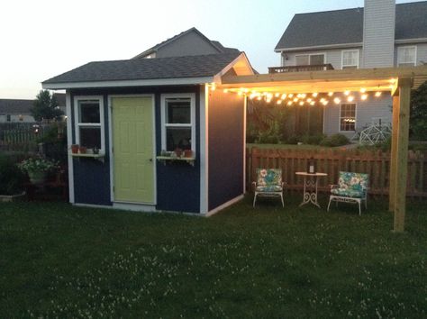 The shed and pergola are coming along nicely! Can't wait to put in the patio and surrounding gardens next spring! (Photo only.) Two Sheds In Backyard, Pergola Attached To Shed, Shed Pergola Combo, Pergola Shed Combo, Pergola Off Shed, Backyard Landscaping With Shed, Shed With Pergola Attached, Shed Placement In Backyard, Shed Patio Ideas