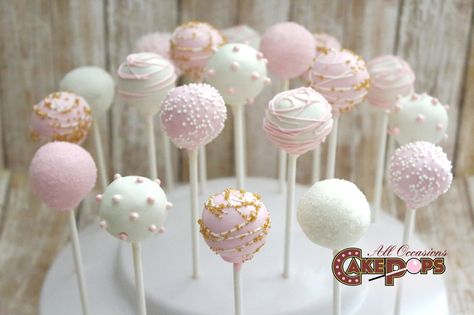 Simple white, pink, and gold cake pops🎀 Pink White And Gold Cake Pops, Pink And Gold Cakepops, Cake Pops Pink And Gold, Cake Pops Pink And White, First Birthday White Theme, White And Pink Cake Pops, Cake Pops First Birthday, Pink And White Birthday Theme, First Birthday Cake Pops