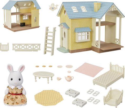 Imaginations soar in the pretend play world of Calico Critters. Open the door to adventure with the perfect starter home. This cute cottage features two floors for hours of adventures under a pale blue roof.The house comes with Maisie Snow Rabbit, an armchair and table set with teapot, teacup, plate with cookies, and a bed with a pink blanket. Pair this with other Calico Critters furniture and fuzzy friends for endless fun!!From EPOCH Everlasting Play Ages 3+ yrs. Calico Critters Furniture, Castle Nursery, Snow Rabbit, Rabbit Girl, Cottage Gifts, Calico Critters Families, Sylvanian Family, Blue Roof, Cute Cottage