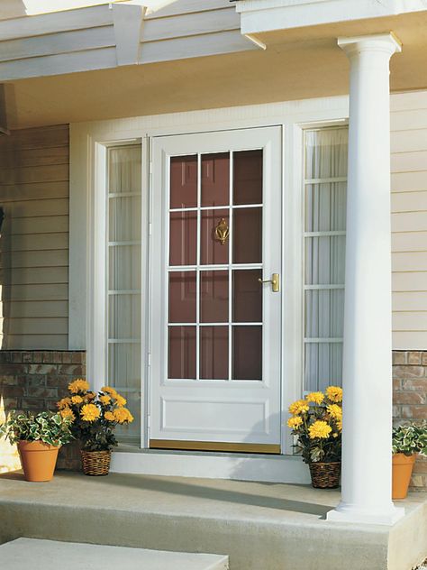 Create an inviting entryway with these tips for choosing a front door. Cottage Entry, Front Door With Screen, Door Pictures, Glass Storm Doors, Replacing Front Door, Main Doors, Color Door, Composite Doors, Front Facade