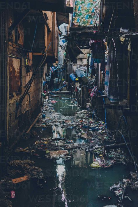 View of narrow dirty and grungy street flooded with water and trash floating on top – Stockphoto Trash On The Street, Flooded City Aesthetic, Flood Aesthetic, Trash Photography, Flooded Street, Trash Aesthetic, Flooded City, Street Trash, City Streets Photography