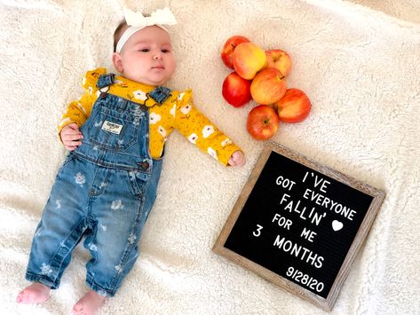 3 month milestone in early fall, late september. Letterboard and apples. Three Month Milestone Pictures, Five Month Milestone Picture, September Baby Pictures Ideas, 8 Month Baby Photoshoot September, Apple Milestone Pictures, Newborn Apple Photoshoot, 3 Month Old Milestones Letterboard, November 3 Month Baby Pictures, Baby Fall Letterboard