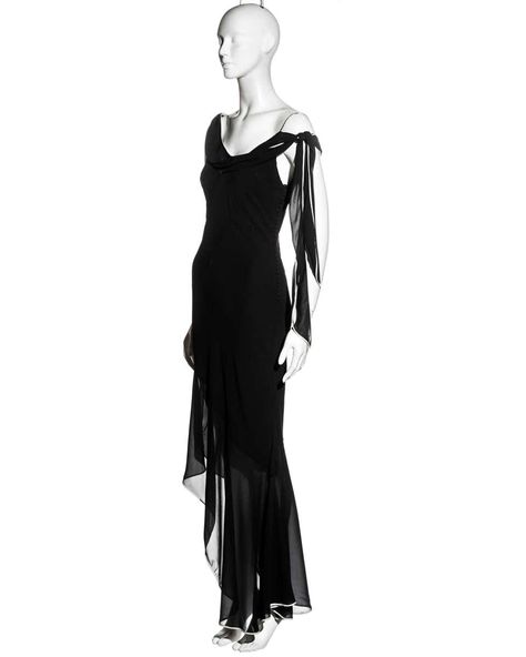 For Sale on 1stDibs - ▪ Christian Dior black silk evening dress ▪ Designed by John Galliano ▪ Cowl neckline with long ties to the shoulder ▪ Spaghetti straps ▪ Bias-cut ▪ White Dior Black Dress, Vintage Dior Dress, Galliano Dress, Galliano Dior, Dior By John Galliano, Silk Evening Dress, Strapless Evening Gowns, Dior Dress, Slinky Dress