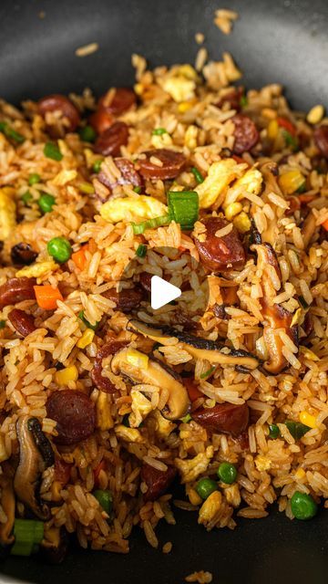 Christian Ou on Instagram: "CHINESE SAUSAGE FRIED RICE: Fried rice is hands down one of my favorite things to make, It is such a great way to use any leftovers you have. You can use whatever vegetables you have lying around and any protein you like. I love adding Chinese sausage because it is packed with sweet and savory flavors, and just makes the fried rice taste better!  INGREDIENTS: 2 cups day old rice 2 eggs 3 Chinese sausage, sliced 4 shiitake mushrooms, sliced 4 clove garlic, minced 2 scallion, separate white and green parts 1 cup frozen vegetables (peas and carrots) 2 tbsp light soy sauce 1 tsp dark soy sauce 1 tsp sesame oil 1/4 tsp white pepper  1/2 tsp chicken bouillon powder (optional)  Directions: 1. In a small bowl, whisk 2 eggs. In a pan or wok, heat 1 tbsp of oil over high Mushroom Fried Rice Chinese, Fried Rice With Chinese Sausage, Sausage Fried Rice, Chicken Bouillon Powder, Rice Fried, Chinese Sausage, Dark Soy Sauce, Peas And Carrots, Chicken Bouillon