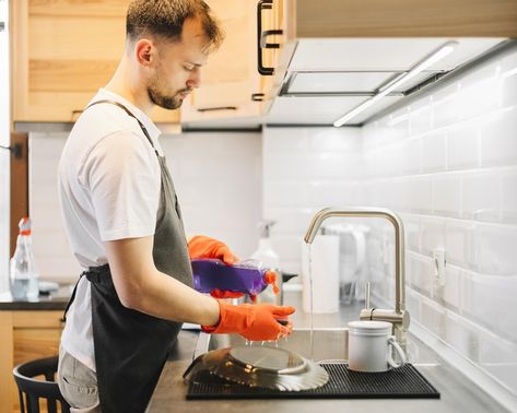 Medium shot man washing dishes Free Phot... | Free Photo #Freepik #freephoto #house Man Cleaning House, House Husband Aesthetic, Man Washing Dishes, Household Photography, Man Cleaning, House Chores, Man Of The House, Pose References, Cleaning Spray