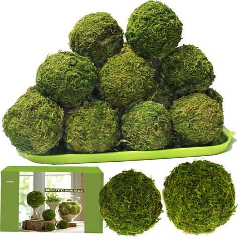 PRICES MAY VARY. [VIBRANT NATURAL DECOR]: Elevate the ambiance of your living space with the vibrant and natural beauty of our Moss Balls. These meticulously handcrafted decorative balls are made from live moss, carefully preserved to retain their lush green hue. Each ball is a testament to nature's intricate design, bringing a touch of outdoor serenity to your indoor environment. Whether displayed in a bowl, vase, or terrarium, these moss balls create a captivating focal point that exudes fresh Fake Moss, Decorative Balls, Bowl Vase, Natural Decor, Moss Balls, Decorative Spheres, Wooden Cheese Board, Kitchen Food Storage, Vase Fillers