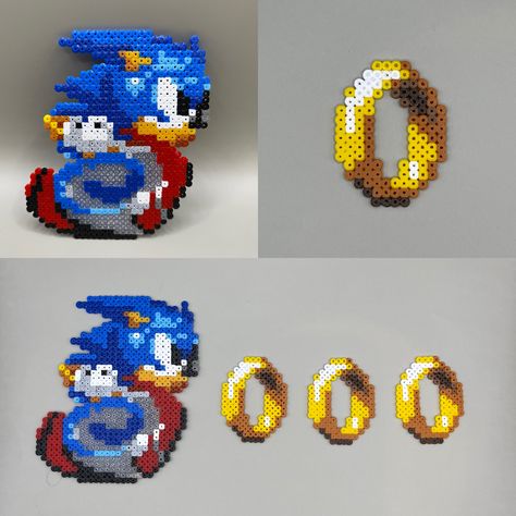 Sonic and rings handmade from Hama/Perler/Pyssla beads. Can be made as fridge magnets, wall decals or the gold rings can be keyrings Sonic Perler Bead Patterns, Sonic Perler Beads, Mini Hama Beads, Hamma Beads Ideas, Pearl Beads Pattern, Fuse Bead Patterns, Perler Bead Templates, Diy Perler Bead Crafts, Bead Sprite