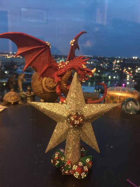 When you decide you want a D&D tree topper thingymajig but can’t find one you like so you make your own. - dnd post - Imgur Dragon Themed Christmas Tree, Nerdy Tree Topper, Dnd Christmas Tree, Dragon Christmas Tree, D&d Christmas, Dnd Ornaments, Dnd Christmas, Diy Tree Topper, Dragon Christmas