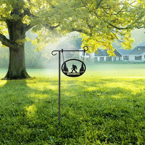 PRICES MAY VARY. Quality Materials - This personalized metal big foot garden flag with stand is constructed from strong, solid 16G carbon steel and finished with a weatherproof powder coat finish. Optional adjustable 34-50" Pole. Pick a Color - Our finished metal hanging metal signs ship professionally coated in a wide variety of colors options which will stay beautiful, rust free and corrosion resistant. Colors include black, green, yellow, brown, pink, navy blue, red, silver, rust, beige, purp Outdoor Home Decor, Front Lawn, Tree Sculpture, Outdoor Home, Design Toscano, Yard Sign, Garden Stakes, Yard Signs, Name Sign