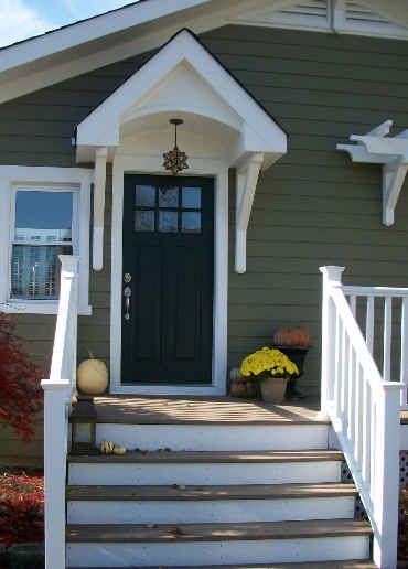 I want a black craftsman style front door. We have a transom above our current door. I LOVE that porch light, too! Front Door Overhang, Door Overhang, Cottage Front Doors, Door Awnings, Porch Steps, Side Porch, Front Steps, Front Porches, Front Porch Ideas