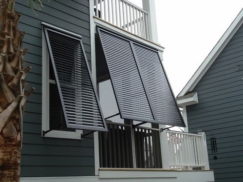 contemporary bahama shutters ideas balcony privacy protection sun shade ideas Window Privacy Screen, Outdoor Window Awnings, Bermuda Shutters, Shutters Window, Bahama Shutters, Window Shutters Exterior, Different House Styles, Plastic Shutters, Louver Windows