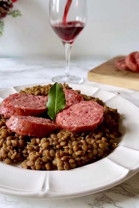 Cotechino with Lentils. The Great Italian New Year's Eve Classic - Recipes from Italy New Years Lentils Good Luck, Italian New Years Lentils, Sicilian Lentil Soup, Italian Lentils And Pasta, Italian Lentil Soup Recipe, How To Make Lentils, New Year's Eve Dinner, Tomato Lentils, Recipes From Italy