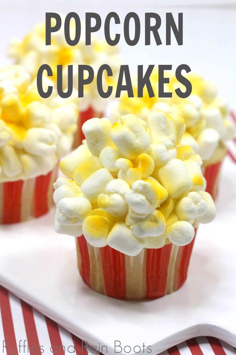 I am SO IMPRESSED by this cute cupcake decorating idea for popcorn cupcakes! They're so simple and a perfect circus cupcake idea. Click here to see how she decorates these unique cupcakes in minutes! #circuscupcakes #dumboparty #popcorncupcakes #rufflesandrainboots Recipes Using Marshmallows, Circus Cupcakes, Carnival Cupcakes, Popcorn Cupcakes, Easy Vanilla Cupcakes, Marshmallow Popcorn, Christmas Cupcakes Recipes, Movie Night At Home, Theme Cupcakes