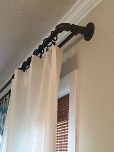 BEST DIY DOUBLE CURTAIN ROD EVER! - 2 YEARS LATER | Sincerely Saturday Industrial Bedroom Diy, Diy Industrial Home Decor, Industrial Curtain Rod, Industrial Curtains, Diy Industrial Furniture, Industrial Pipe Furniture, Diy Curtain Rods, Industrial Farmhouse Decor, Industrial Diy