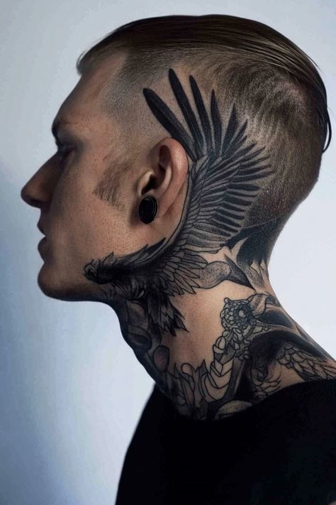 Man with a winged tattoo design on the side of his head and neck. Whole Neck Tattoo Men, Men Head Tattoo, Back Of The Neck Tattoos Men, Neck Sleeve Tattoo Men, Flame Neck Tattoo, Men Face Tattoo, Guy Neck Tattoos, Side Face Tattoo Men, Blackwork Neck Tattoo