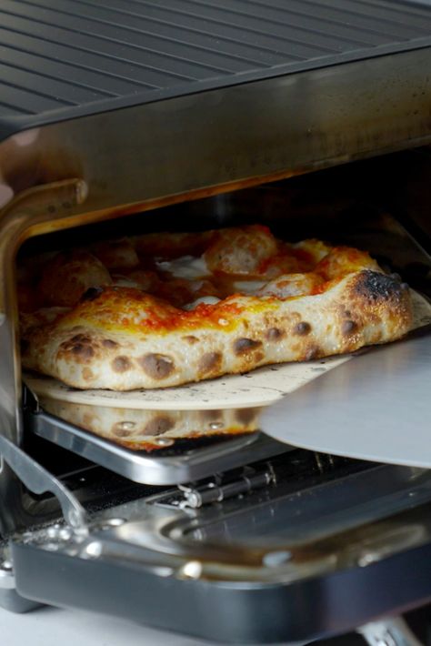 These electric pizza ovens promise to make it easier, faster, and more fun to bake great pizza at home. How do they compare? We found two pizza ovens that gave us pizzeria-quality pies with exceptionally pillowy, chewy-tender crust. Indoor Pizza Oven, Electric Pizza Oven, Pizza At Home, Smart Oven, Large Pizza, Great Pizza, Pizza Oven Outdoor, Baking Stone, Oven Canning