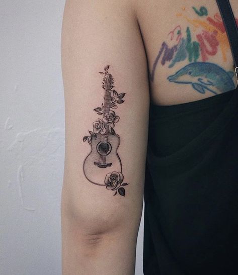 Pretty Guitar Tattoo, Acoustic Guitar With Flowers Tattoo, Guitar Butterfly Tattoo, Guitar With Roses Tattoo, Rose And Guitar Tattoo, Guitar And Piano Tattoo, Guitar Rose Tattoo, Feminine Music Tattoos, Ukulele Tattoo Ideas