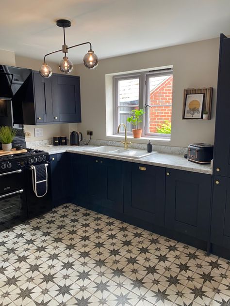 Contemporary kitchen with feature floor tiles #navykitchen #rangecooker White Tiles Black Grout, Navy Kitchen Cabinets, Blue Kitchen Tiles, Bungalow Kitchen, Galley Kitchen Design, Navy Kitchen, White Tile Floor, Kitchen Backsplash Designs, House Design Kitchen