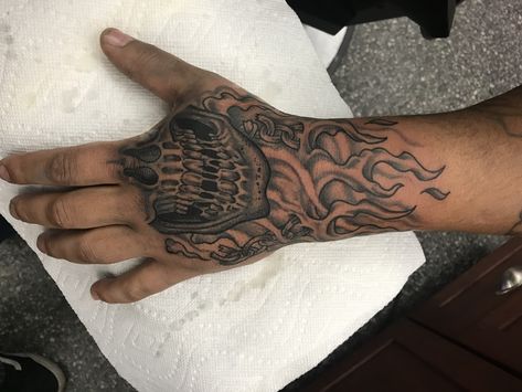 Skull flame hand tattoo Skull And Fire Tattoo, Flame Hand Tattoo Men, Flames Hand Tattoo, Red Hand Tattoo Men, Fire Neck Tattoo, Fire Tattoo For Men, Flame Hand Tattoo, Fire Tattoos, Traditional Heart Tattoos