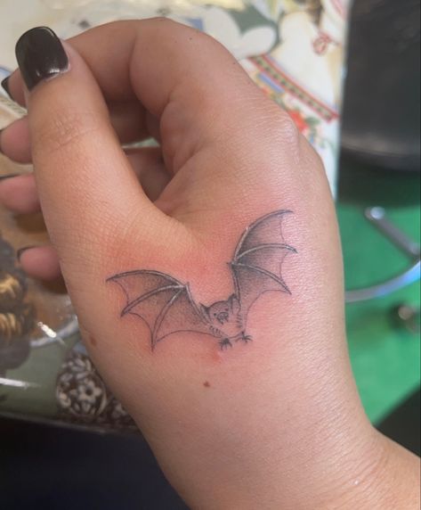 Matching bat tattoo with Kelly and Ozzy Osbourne done by Shamrock Social Club Bat Tattoo Aesthetic, Vampire Tattoo Stencil, Bat Family Tattoo, Aesthetic Bat Tattoo, Bat Tattoos Small, Ozzy Osbourne Bat Tattoo, Ozzy Bat Tattoo, Wrist Bat Tattoo, Bat Tattoo On Hand