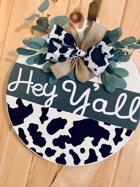 Country Door Hangers, Cow Print Door Hanger, Cow Print Signs, Cow Door Hanger, Diy Crafts To Sell Unique, Cow Print Round Door Hanger, Hey Yall Door Hangers, Hey Yall Door Sign, Circle Door Signs Diy