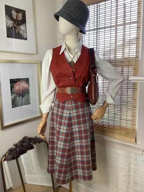 IMPORTANT! PLEASE READ FULL DESCRIPTION AND LOOK AT ALL POSTED PHOTOS  Vintage late 1970s-early 80s Pendleton wool home tailored plaid A-line skirt and wool blend button front vest set. Both pieces were lovingly home tailored, the skirt of virgin wool Pendleton fabric and fully lined in acetate fabric with hook and zip closure at back waist, the vest I'm guessing is a wool blend with button front. Beautiful tones perfect for autumn, rust colored vest and plaid skirt in blues, grey and rust, in g Vintage Wool Vest, 70s Inspired Outfits, Pendleton Fabric, Colorful Vest, Plaid Wool Skirt, Vest Set, 70s Outfits, Disco Dress, 80s Outfit