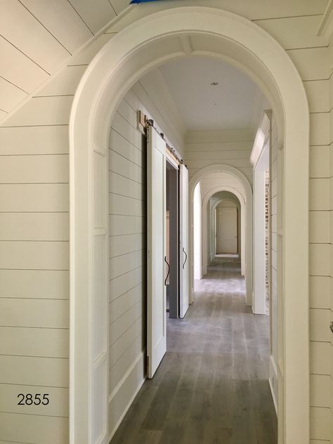 Half round arched openings are the perfect compliment to this farmhouse styled home. Arched Window Casing, Trim Arched Opening, Shiplap Archway, Arched Cased Opening, Arches In Homes Interiors, Opening Between Rooms, Craftsman Molding And Trim, Porch To Mudroom, Archway Trim