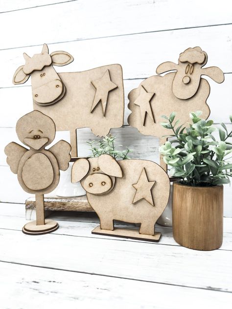 This everyday paint-your-own craft kit includes the mdf wood blank Set of 4 Farm Animals DIY Kit. Includes 1 Cow, 1 Sheep, 1 Pig, 1 Chick This barn animal craft cut out is the perfect craft night project for adult crafters and a great kids project idea.Use your creativity and to customize and personalize this blank DIY craft kit!This kit does not include paint, glue, brushes, or any additional embellishments to complete the Set of 4 Farm Animals DIY Kit. You will only receive the wooden craft ki Diy Farm Animals Crafts, Craft Night Projects, Farm Animal Decor, Barn Crafts, Farm Animals Decor, Farm Animal Crafts, Farm Craft, Wood Projects Plans, Animal Craft