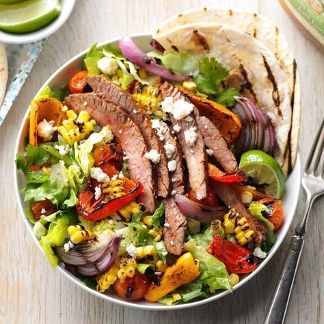 Fajita in a Bowl Recipe -Pull out the skewers and take a stab at grilling peppers, onions and corn for an awesome steak salad that’s all summer and smoke. —Taste of Home Test Kitchen, Milwaukee, Wisconsin Sirloin Salad, Recipes For Steak, Tomatillo Dressing, Steak Salad Recipe, Don Pollo, Beef Flank Steak, Bean Salsa, Grilled Peppers, Taco Salad Recipes