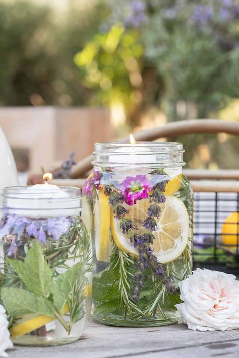 DIY Citronella Candle Jars Citronella Jars, Diy Citronella, Water Candles Diy, Mint Decor, Citrus Slices, Water Candle, Rustic Table Decor, Citronella Oil, Citronella Candles