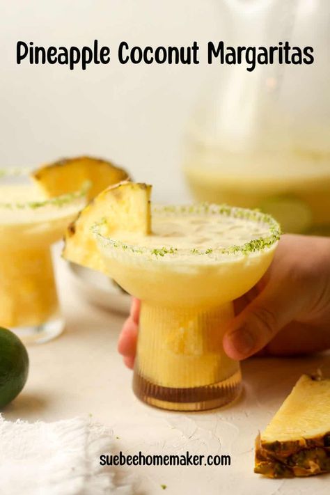 These Pineapple Coconut Margaritas are tropical cocktails that include tequila, triple sec, pineapple juice, coconut milk, lime juice, and Agave. Serve these in a salt-rimmed glass and enjoy with friends! Pineapple Coconut Margarita, Homemaker Recipes, Pineapple Margaritas, Pineapple Margarita Recipe, Coconut Tequila, Juice Coconut, Happy Hour Food, Tropical Cocktails, Enjoy With Friends