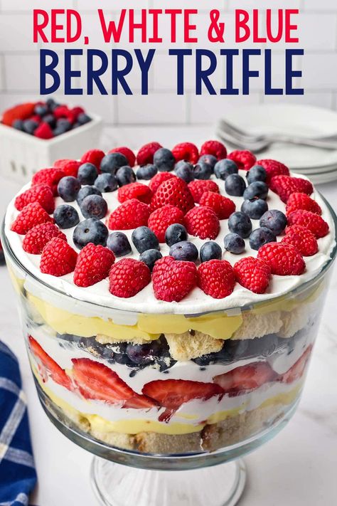 This show-stopping Red White and Blue Berry Trifle Recipe combines pound cake, fresh berries, pudding, and whipped cream for an amazing no-bake dessert! Trifle With Pound Cake, Red White And Blue Trifle, Angel Food Cake Trifle, Berry Trifle Recipe, Trifle Bowl Recipes, Trifle Dessert Recipes, Cheesecake Trifle, Berry Trifle, Trifle Dish