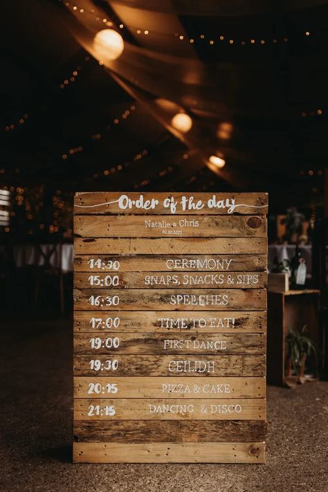 Wooden Order of Day Sign Milton Keynes Wedding Thyme Lane Photography #wedding #weddingsign Wooden Pallet Wedding, Cheap Fun Wedding Ideas, Lyneadaprix Wedding Board, Wooden Order Of The Day Wedding, Rustic Order Of The Day, Order Of Service Pallet Wedding Lights, Order Of The Day Wedding Pallet, Order Of The Day Pallet Wedding, Skid Wedding Sign