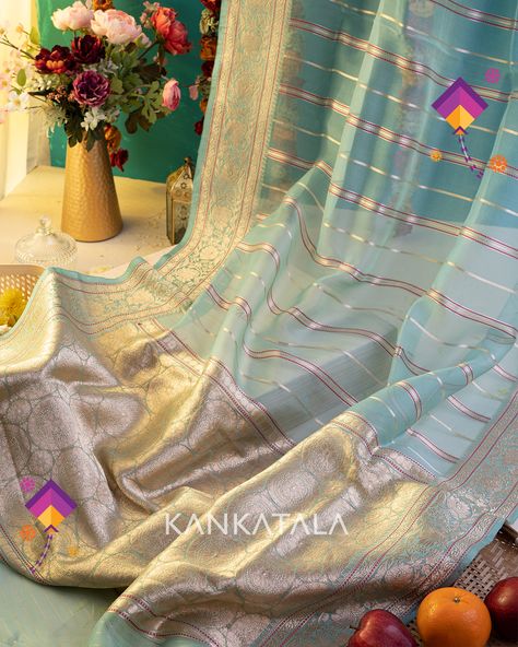 Queen of Kankatala who is warming up to wearing a saree, this Banarasi weave is an easy breezy drape and can be styled in many ways. #pongalcelebration #sankranti #makarsankranti #festivegifting #sareegifting #festiveseason #kankatala #pongalcollection Pastel Blue Organza Saree, Kankatala Sarees, Blue Organza Saree, Benaras Sarees, Bride Things, Pongal Celebration, Bridal Sarees South Indian, Blue Organza, Saree Design