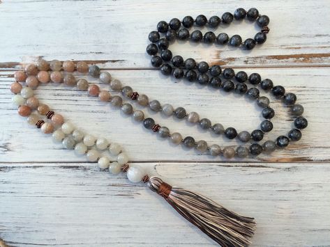 "Divine Feminine Moonstone 108 Mala, with White, Peach, Gray and Black Moonstone. For the Goddess that you are. Great for intuition, emotional balance, and to connect to your femininity. Now available in 6mm or 8mm stones, choose in drop down menu.  Details: Made with high quality White, Peach, Gray and Black Moonstone, with copper spacer beads to use as markers during meditation to help bring your focus back to your breath or intention. They are hand knotted with silk cord between each bead whi Feminine Divine, Buddha Bracelet Beads, Beads Tassels, Rose Quartz Mala, Coin Pearl Necklace, Artisan Jewelry Necklaces, Lucky Jewelry, Chakra Beads, Buddha Beads