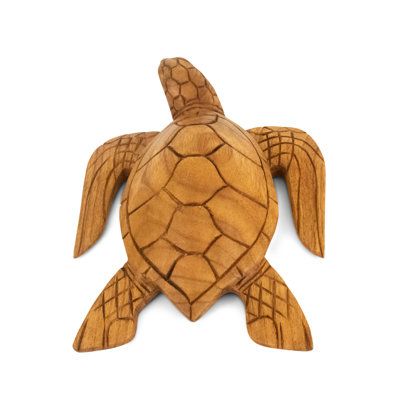 No matter how strong the currents, just keep swimming. Be reminded of your resilience by this wooden sea turtle decoration! Perfect as a shelf ornament, table decoration or desk accessory, the hand-carved turtle sculpture is complementary to home or office décor with a coastal aesthetic. Rest the handmade tortoise carving on any flat surface. Size: 3.50" H x 7" W x 9.50" D | Bay Isle Home™ Aalaya Handmade Animals Figurine / Sculpture 3.5 H x 7.0 W x 9.5 D in / grayWood in Brown | 3.50" H x 7" W Tortoise Home, Carved Turtle, Tortoise House, Turtle Sculpture, Just Keep Swimming, Turtle Decor, Home Decor Sculptures, Coastal Aesthetic, Keep Swimming