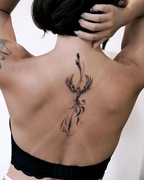 Tattoos Phoenix Rising Women, Phoenix Tattoo Design Feminine Back, Lower Back Phoenix Tattoo, Phoenix Tattoo Neck, Small Phoenix Tattoos For Women Simple, Rising Phoenix Tattoo Feminine Back, Small Phoenix Tattoo Men, Birds Back Tattoo, Phoenix Tattoo Feminine Back