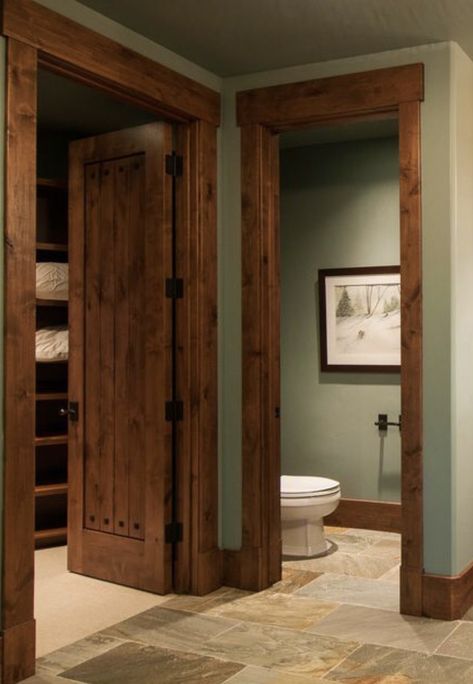 Dark Stain Trim Interior, Stained Wooden Doors Interior, Wood Trim Door Frame, Wood Interior Trim Stained, Rustic Farmhouse Doors Interior, Homes With Wood Trim Interiors, Wood Doors With Wood Trim, Rustic Wood Trim Ideas, Wood Stain Trim Interior