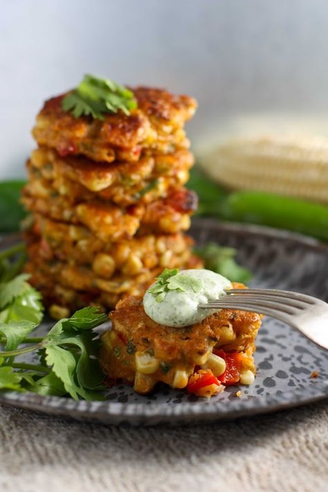 A simple tasty recipe for Spicy Corn Fritters using fresh corn, with a flavorful cilantro dipping sauce. Fast and easy to make .....and full of flavor! Cilantro Dipping Sauce, Dip Vegetarian, Cilantro Dip, Cheddar Corn, Corn Fritter, Feasting At Home, Corn Fritter Recipes, Vegetarian Main Course, Spicy Corn