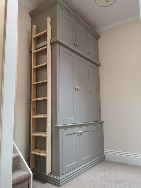 Tall Ladder Storage, Built In Wardrobe With Ladder, Pantry Ladder Ideas, Ladder Cupboard, Utility Closet Makeover, Wardrobe With Ladder, High Ceiling Storage, Closet Ladder, Laundry Ladder