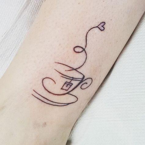 Beauty created by my lovely tattoo artist Gabriele in London! Delicate swirls and a heart to top it off. Cuppa Tea Tattoo, Tea Pot And Cup Tattoo, Yea Bag Tattoo, Teapot And Teacup Tattoo, Tiny Teacup Tattoo, Tea Party Tattoo, Baking Tattoo Ideas, Tea Tattoo Ideas, Teabag Tattoo