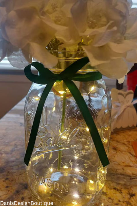 These lighted mason jars with ribbon are beautiful centerpieces for any event or for home decor!!!! Choose any color ribbon or flowers that you like. Click the shop link to see more...

#masonjar #centerpiece #counterdecor #homedecor #gift #hydrangea #green Lighted Mason Jars, Hydrangea Green, Jar Centerpieces, Metallic Spray Paint, Greenville South Carolina, Counter Decor, Mason Jar Centerpieces, Mason Jar Lighting, Painted Mason Jars