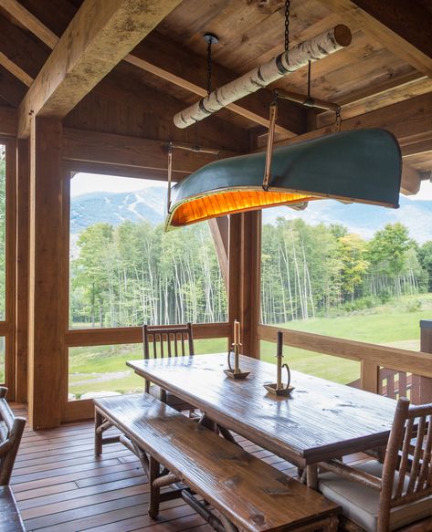 This light fixture was designed from a canoe. A custom design by Milford Cushman to establish a center piece in this Vermont modern home's screened in porch area. Hanging Canoe Decor, Canoe Decor Ideas, Canoe Light Fixture, Wooden Canoe Decor, Hanging Lamp Ideas, Canoe Bar, Canoe Decor, Canoe Storage, Canoe Rack