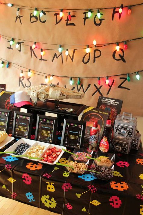 Check out this cool Stranger Things Halloween themed party! Love the backdrop! See more party ideas and share yours at CatchMyParty.com   #catchmyparty #partyideas #halloween #halloweenparty #strangerthings #haunted #party #backdrop Stranger Things Halloween Decorations, Halloween Decorations Party Scary, Stranger Things Party, Stranger Things Halloween Party, Stranger Things Theme, Cheap Halloween Decorations, Stranger Things Halloween, Adult Halloween Party, Scary Halloween Party