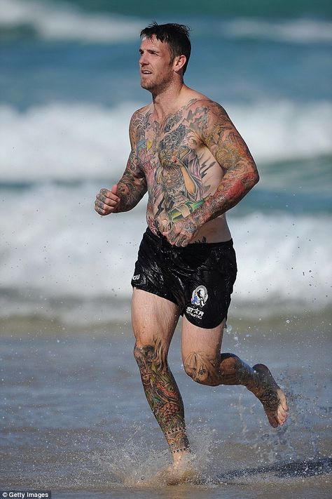 Mr Swan's trademark tattooed body: covered from head to toe in an array of intimidating ink Men In Shorts, Football Tattoo, Masculine Men, Inked Men, Rugby, Mens Shorts, Football, Running, Tattoos