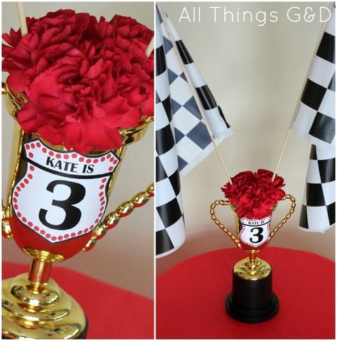 The Making of Kate's Cars Birthday Party - Piston Cup trophy centerpiece. | www.allthingsgd.com Piston Cup Trophy, Cars Themed Birthday Party, Two Fast Two Furious, Car Centerpieces, Lightning Mcqueen Party, Disney Cars Theme, Ben 1000, Cars Birthday Party, Disney Cars Party